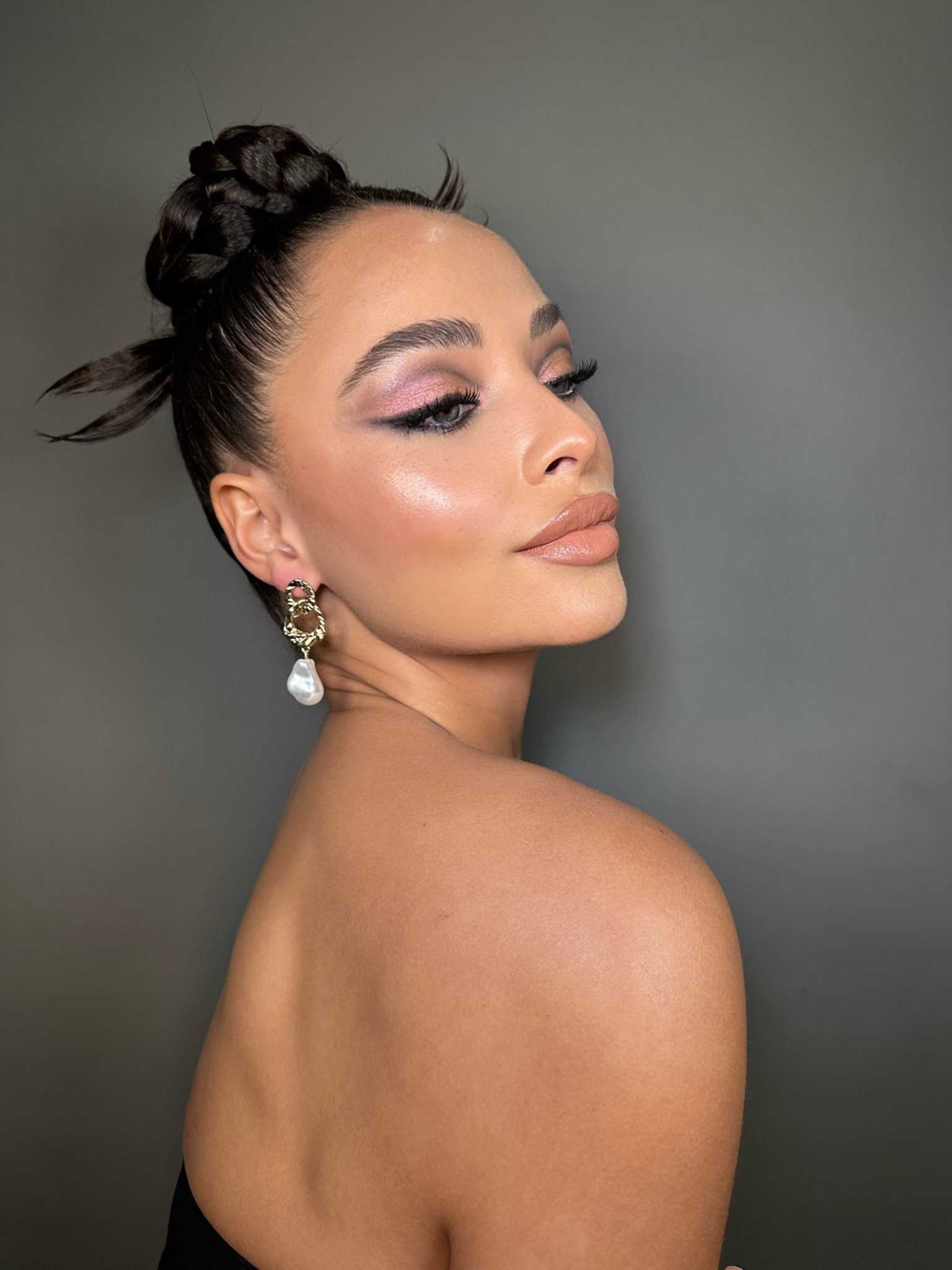 Soft braided bridal updo with pearl earrings, wedding hair and makeup by Andrada Rusu
