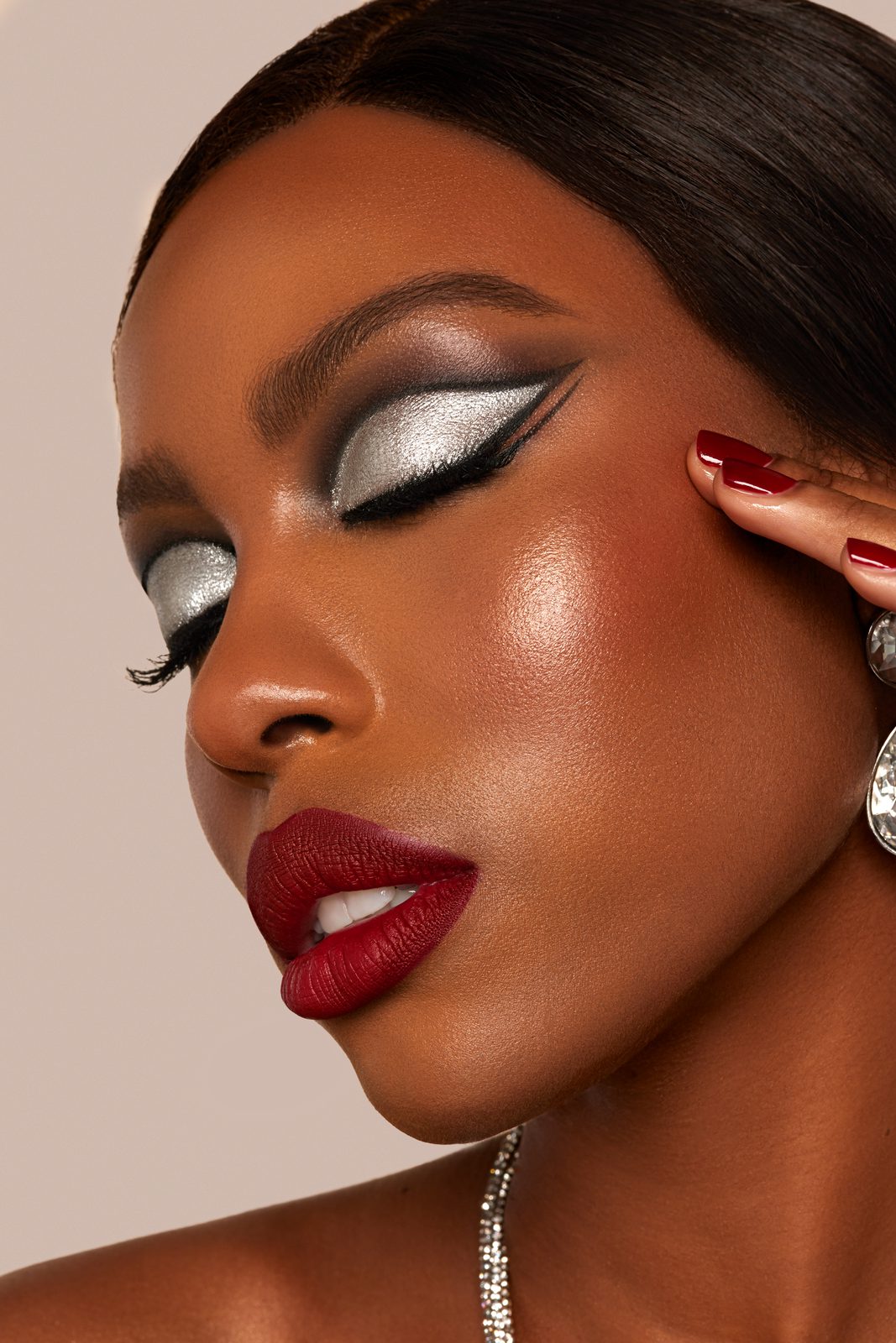 Silver graphic liner and red lip beauty editorial, makeup by Andrada Rusu