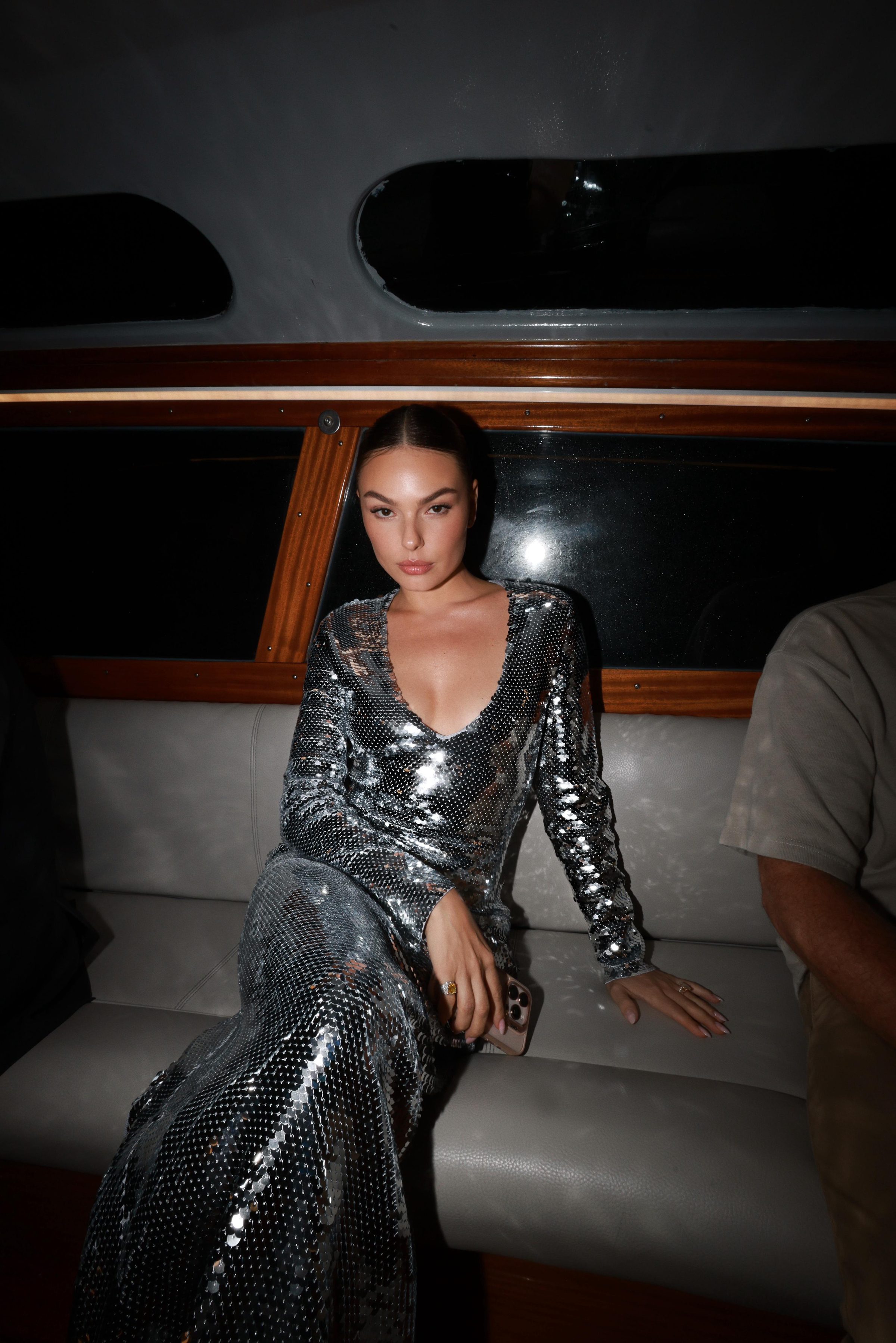 Andrada Rusu hair and makeup, sequin look on the water in Venice